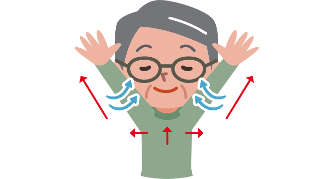 両手を上げながら