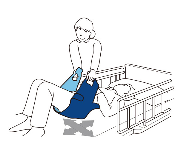 ２．膝をたてます。ペンギンサポートの両端にある取っ手穴をひいて回転させるように側臥位［そくがい］にし、面ファスナーをサイドレールにとりつけます。